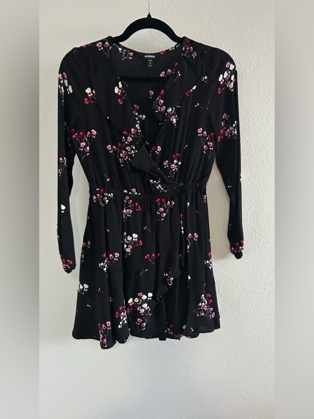 Express Black Floral Wrap Romper with Pink and White Blossoms
